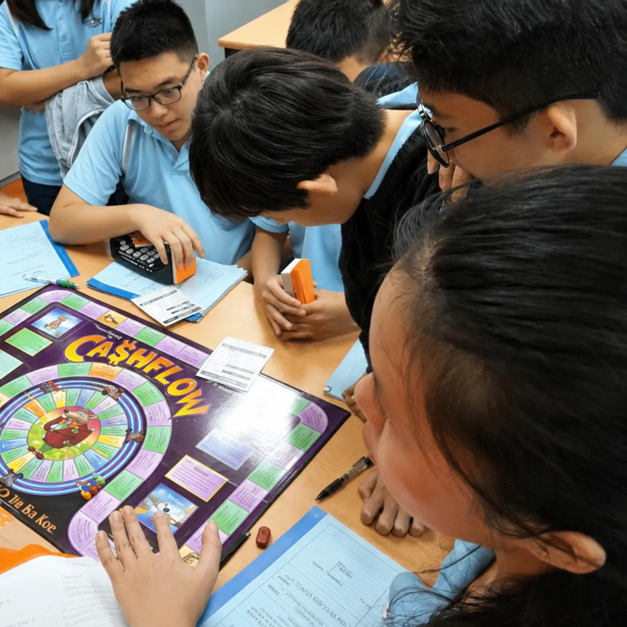 Students playing the CashFlow board game