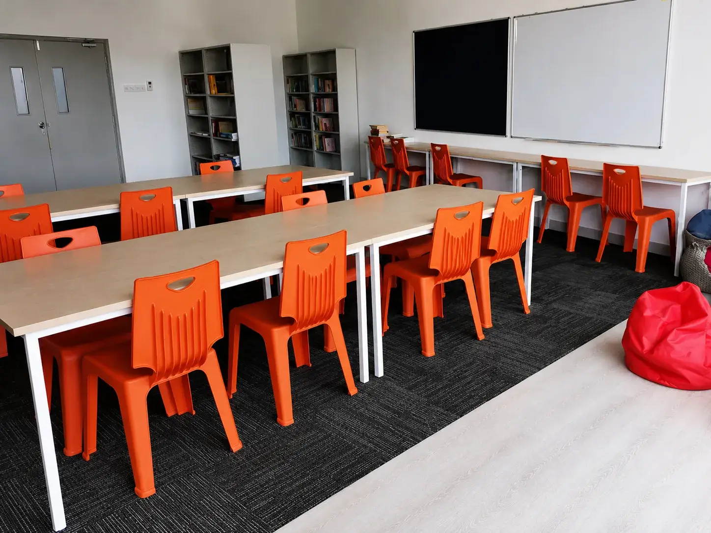 School library with study tables and chairs